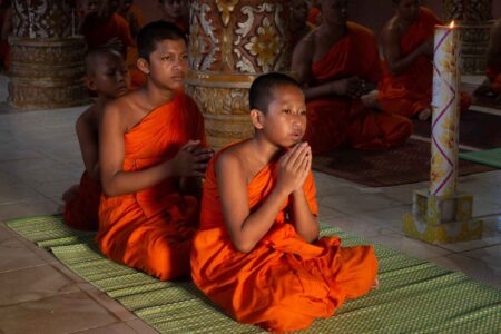 A group of Khmer novice monks are on a prayer at Som Rong pagoda, Soc Trang province, Vietnam. September 2024.
The Mekong Delta region in Vietnam is a culturally diverse area, primarily inhabited by Vietnamese (Kinh), Khmer, Hoa (Chinese), and Cham ethnic groups. While the Kinh are the majority, the Khmer represent a significant, long-settled indigenous community, contributing to the distinct cultural identity and agricultural practices of the southern delta